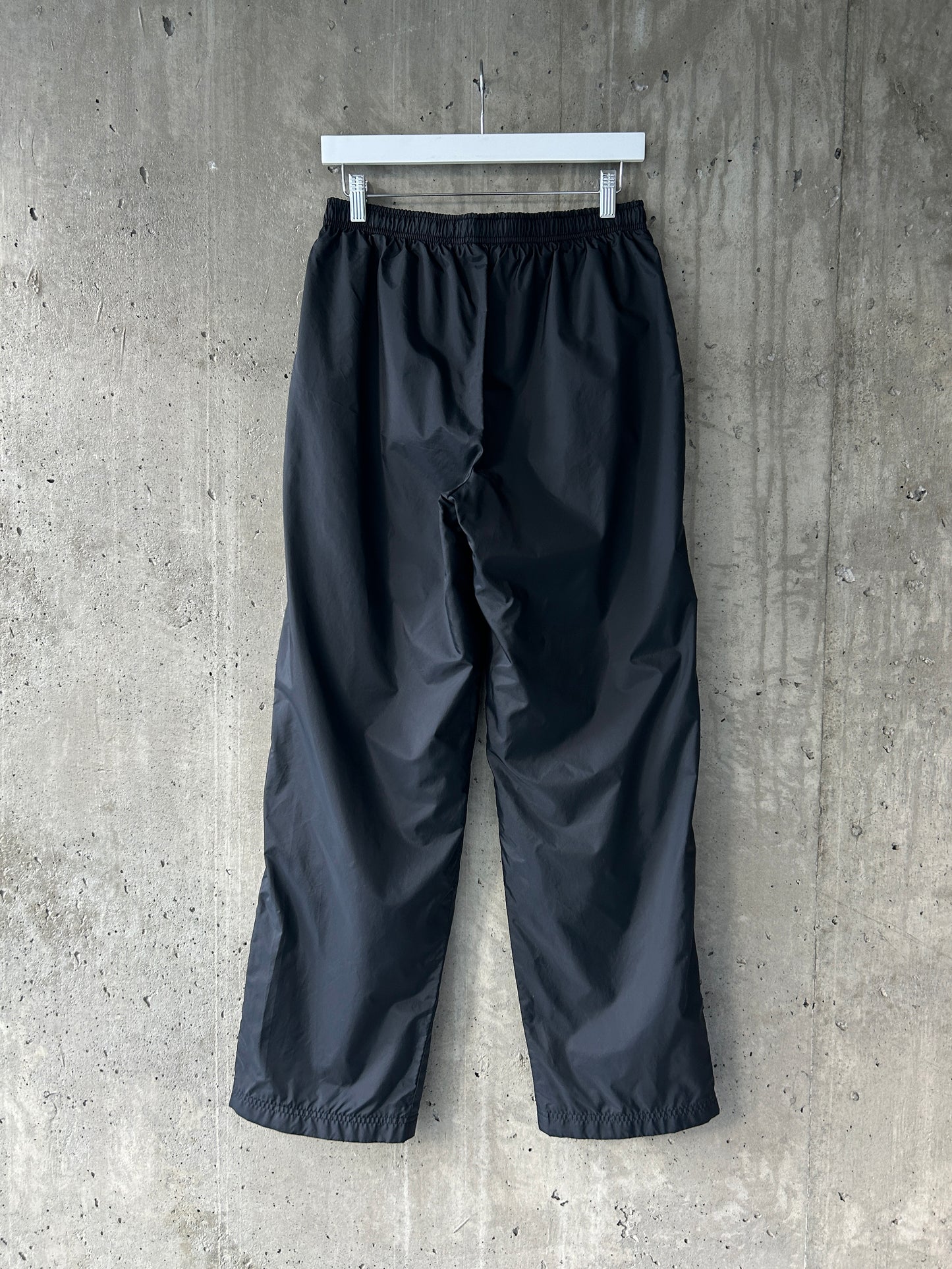 Nike black nylon ankle-zip track pants with white piping