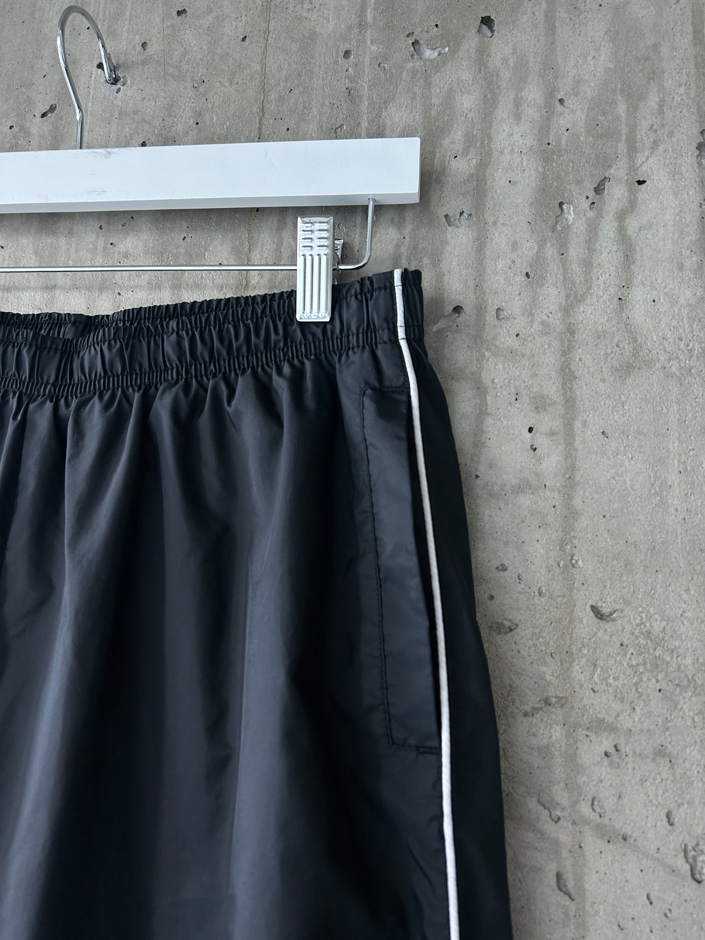 Nike black nylon ankle-zip track pants with white piping