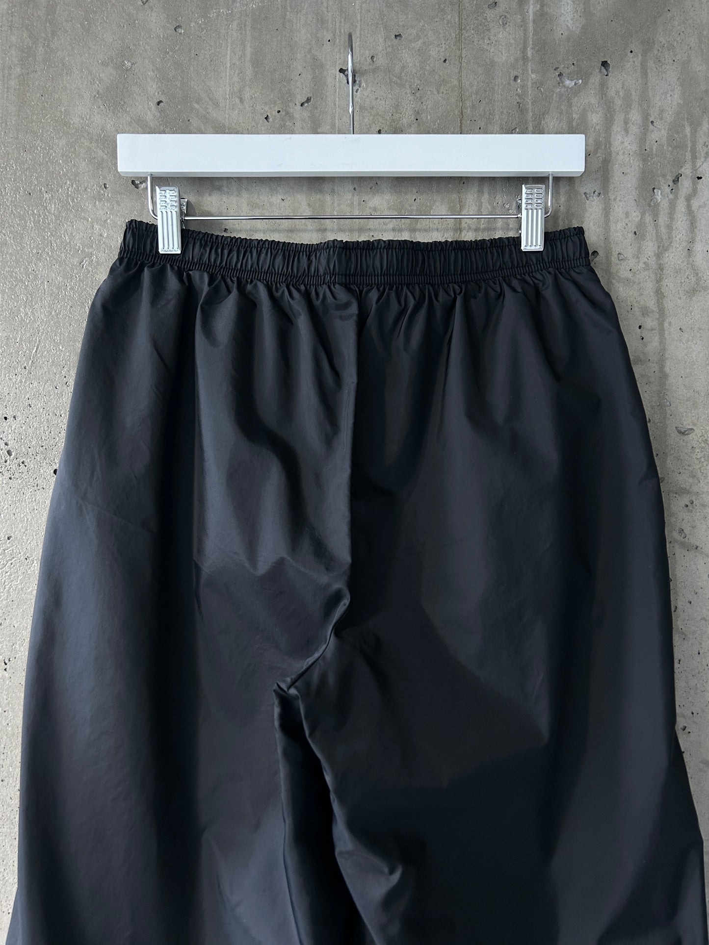 Nike black nylon ankle-zip track pants with white piping