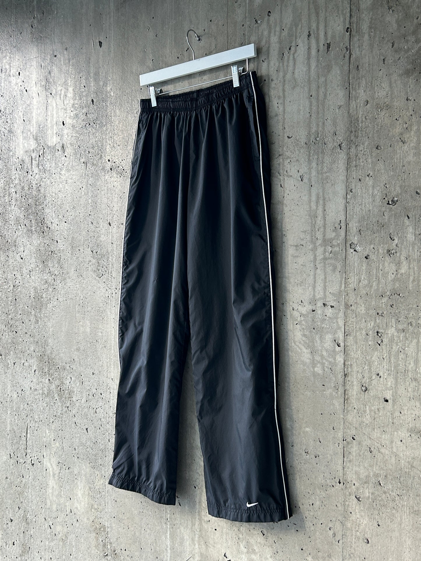 Nike black nylon ankle-zip track pants with white piping