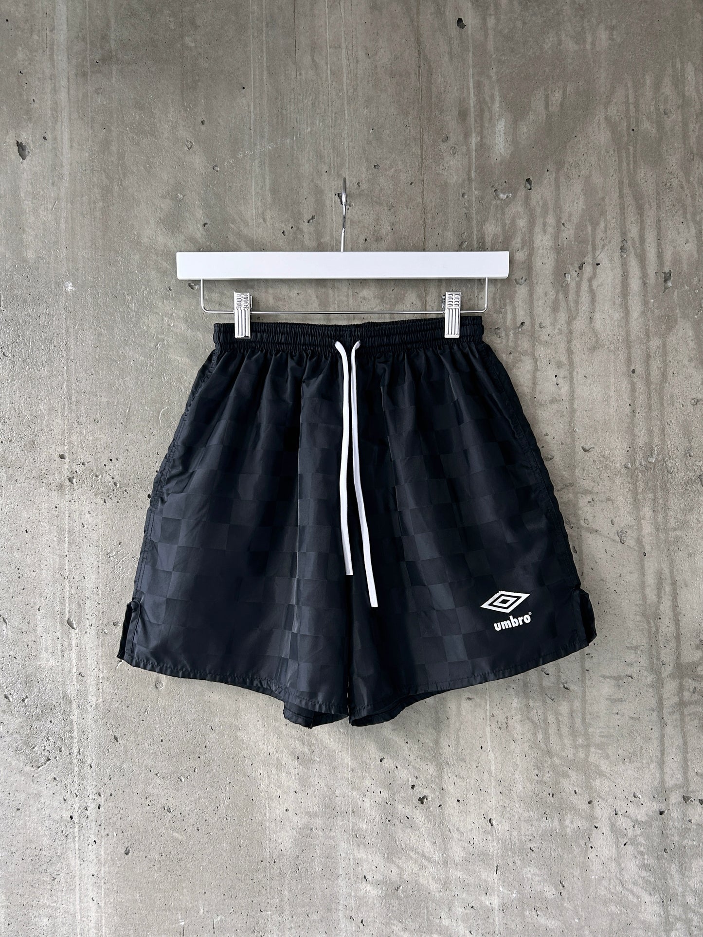 Umbro black nylon tonal checkered soccer shorts