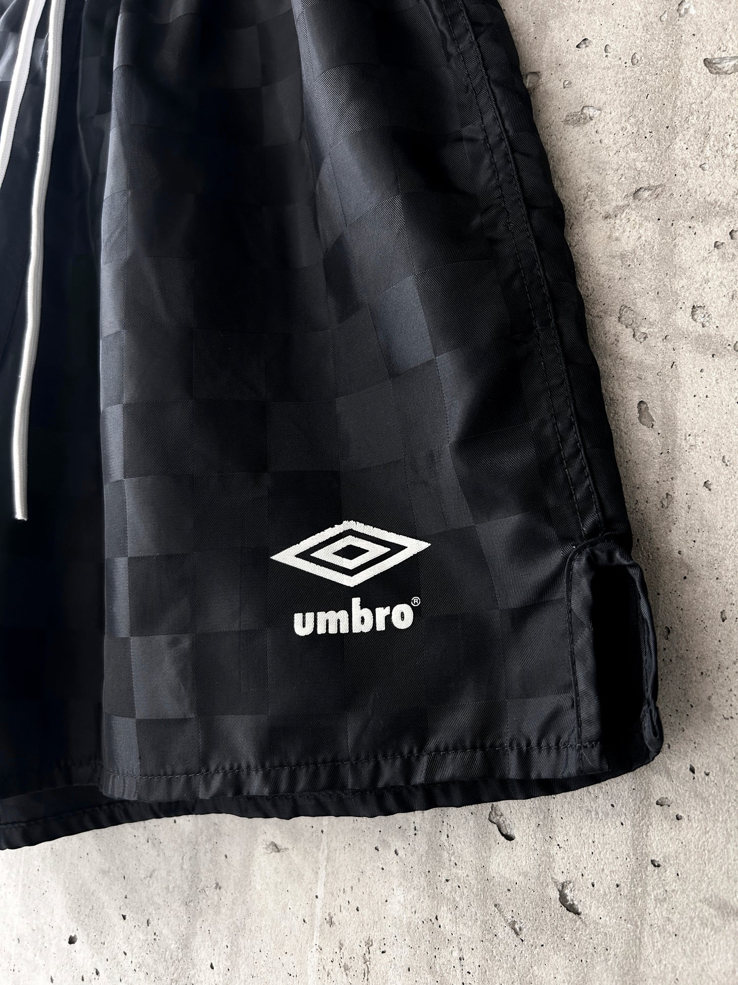 Umbro black nylon tonal checkered soccer shorts