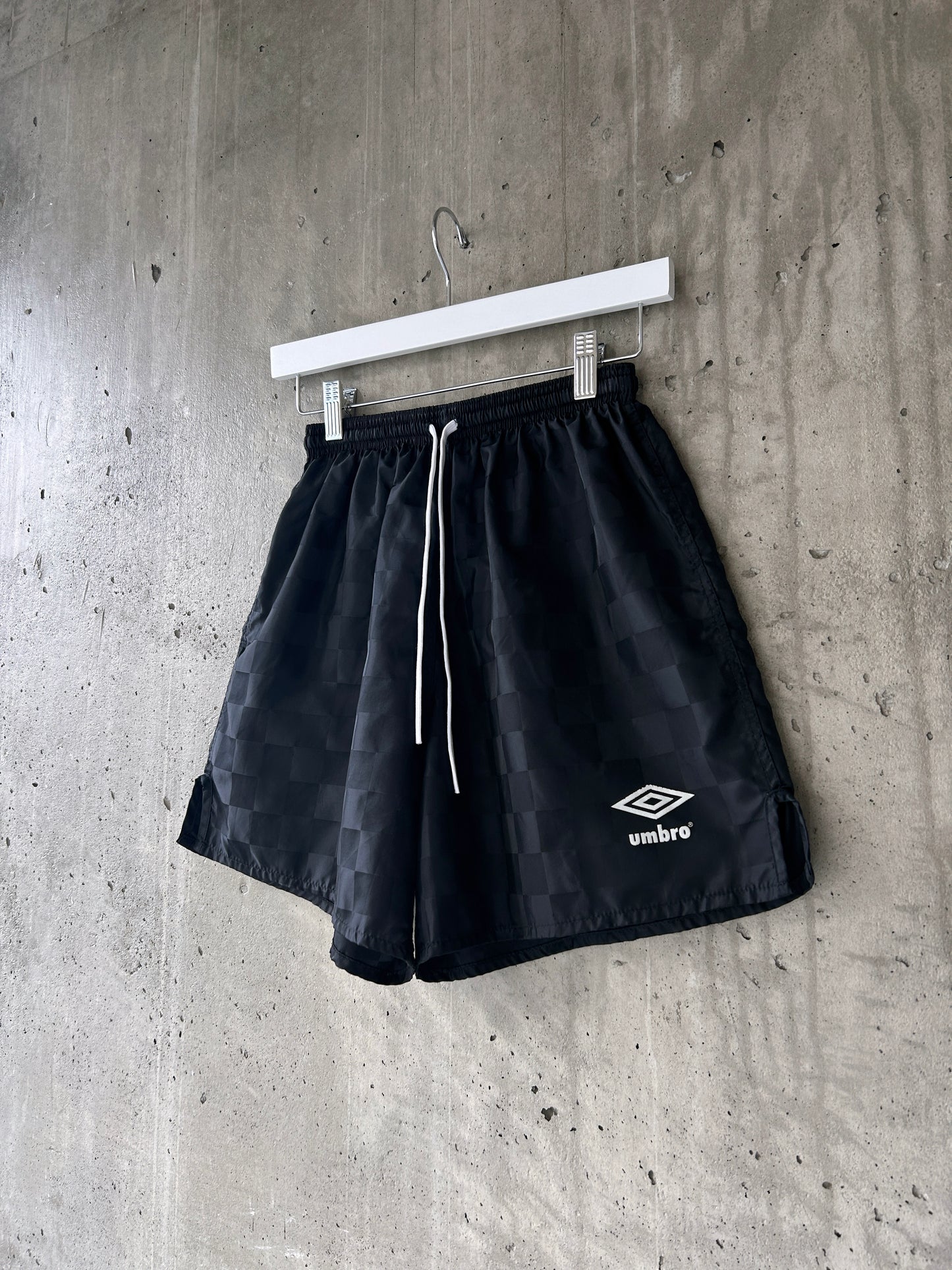 Umbro black nylon tonal checkered soccer shorts