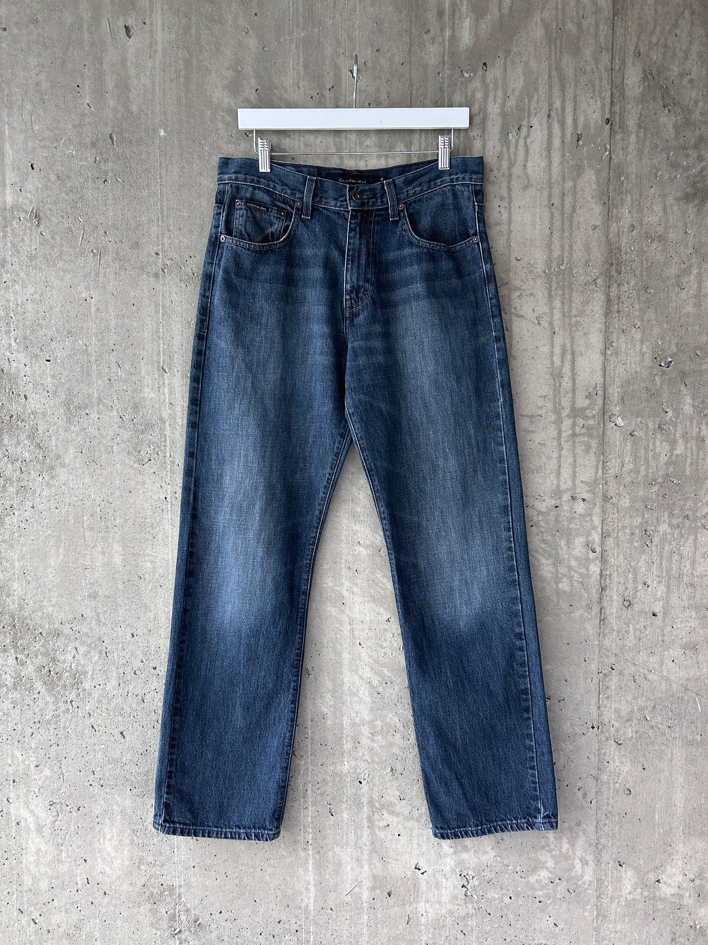 Calvin Klein blue mid-dark wash denim relaxed straight leg jeans