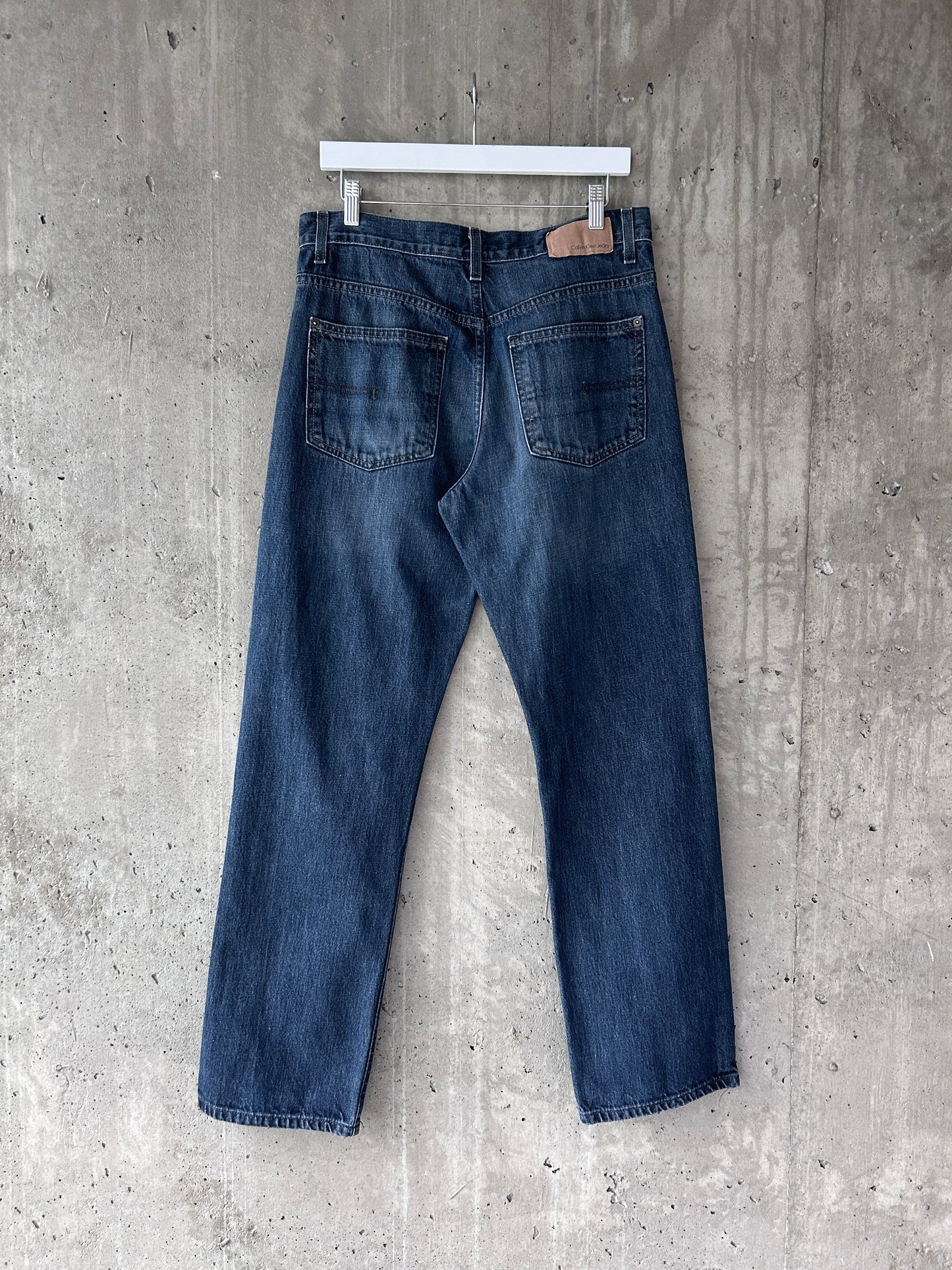 Calvin Klein blue mid-dark wash denim relaxed straight leg jeans