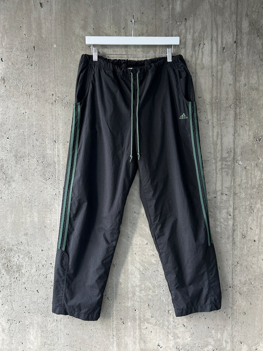 adidas black nylon track pants with green stripes