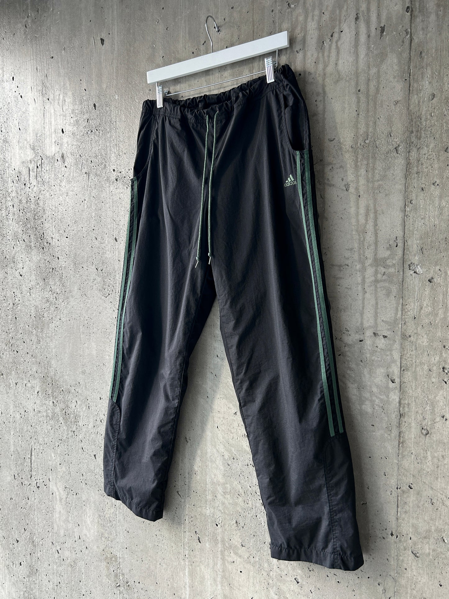 adidas black nylon track pants with green stripes